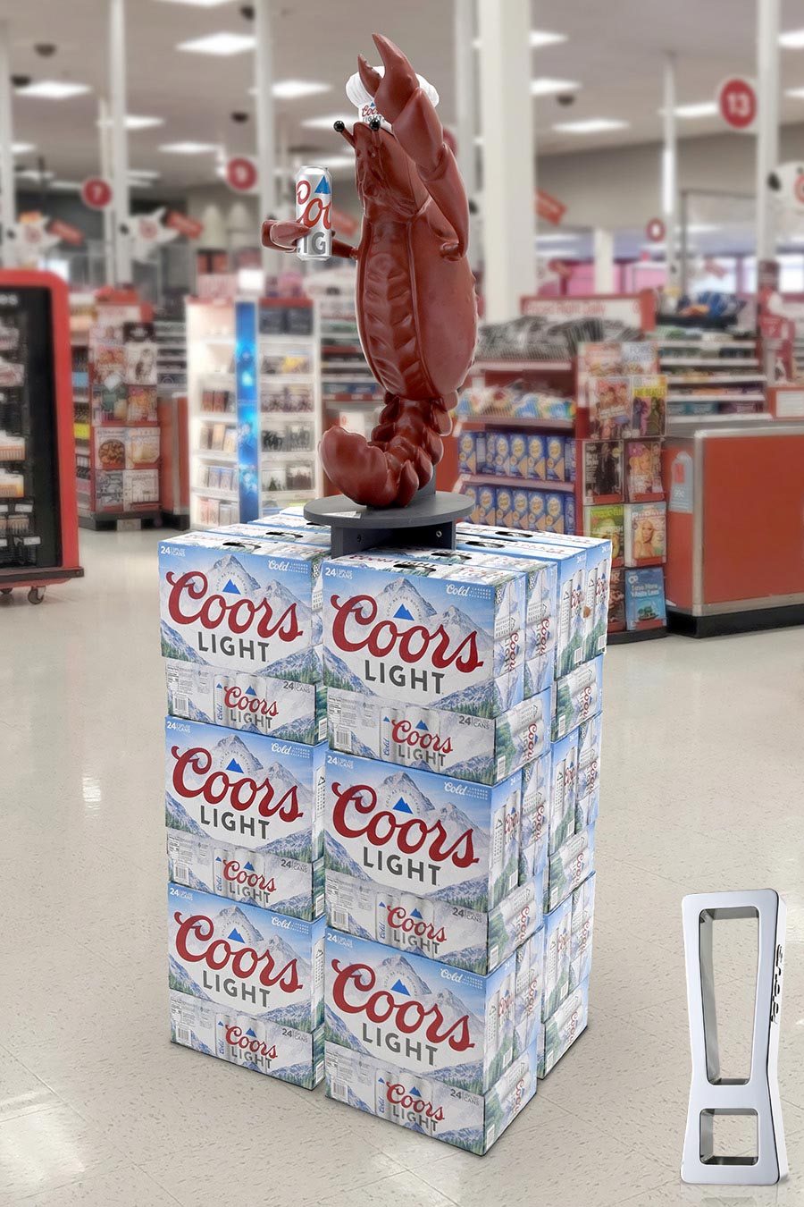 Large lobster statue holding a can of Coors Light atop a stack of Coors Light boxes in a supermarket display